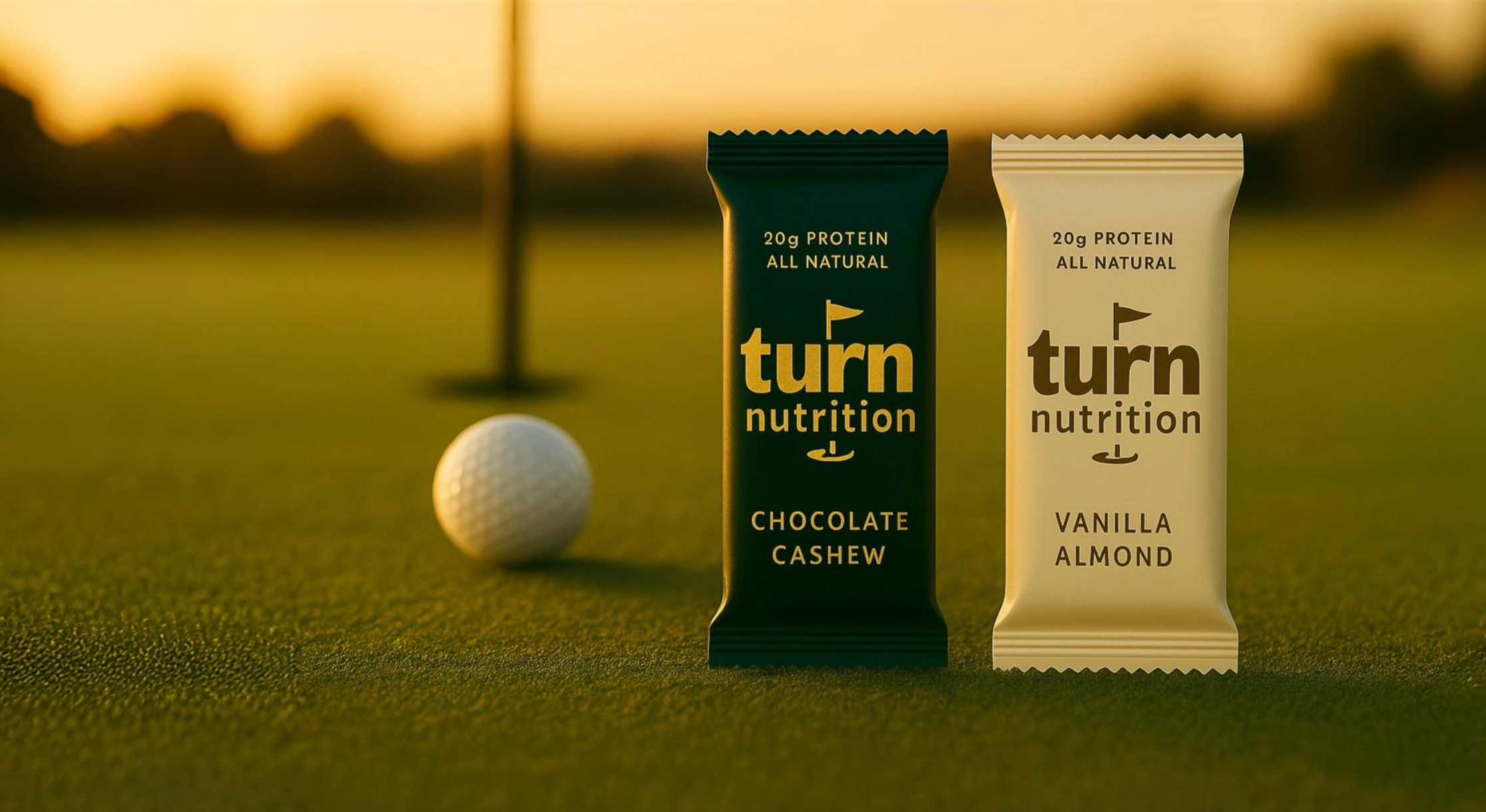 Two protein bars from turn nutrition on a golf course with a golf ball.